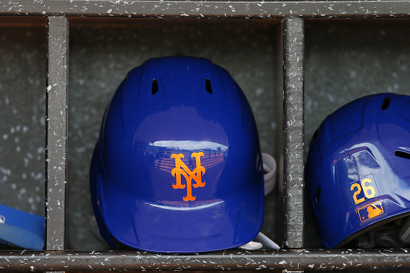 New York Mets David Wright throws his helmet after striking out