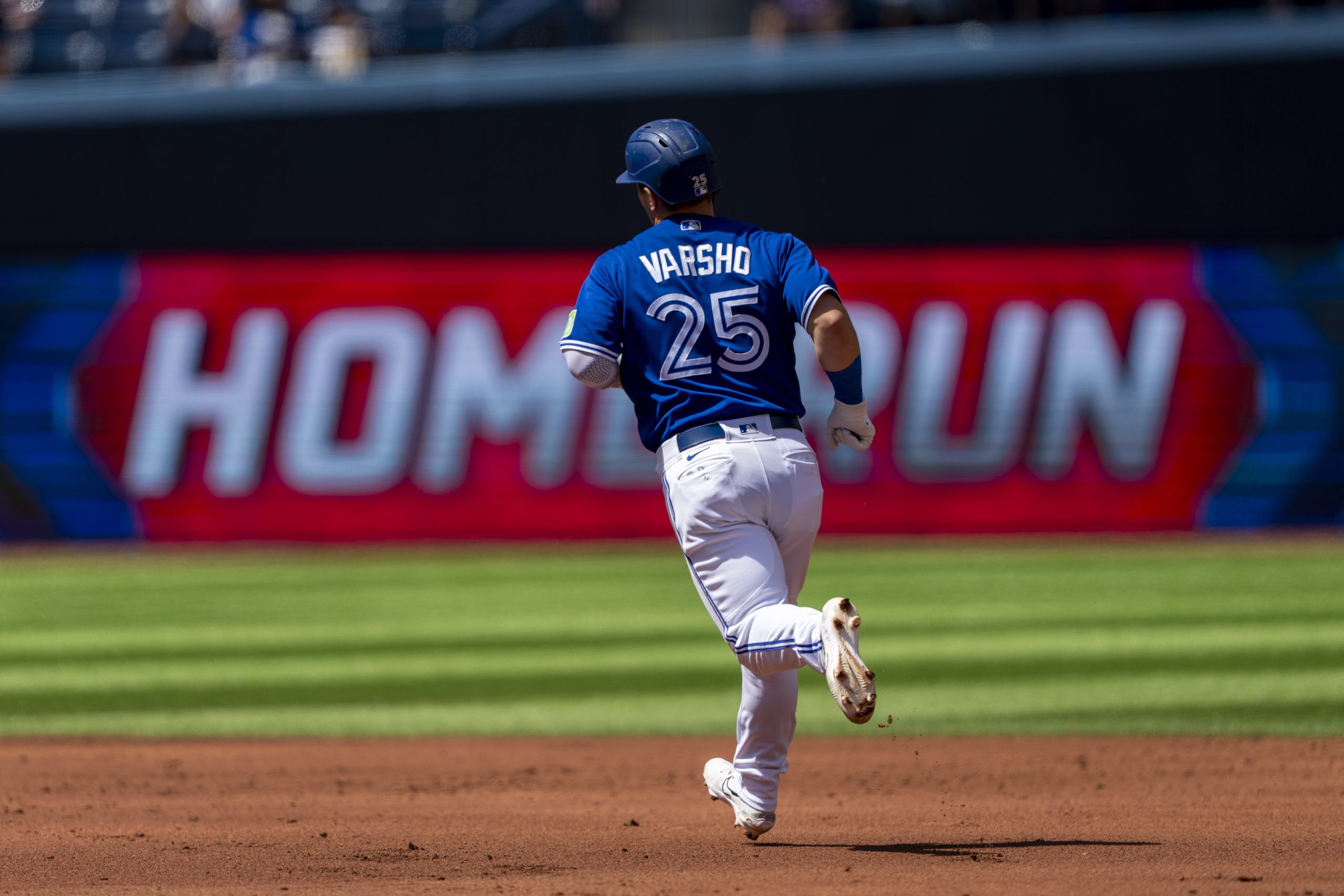 Three homers by Toronto power the Blue Jays past the Rockies