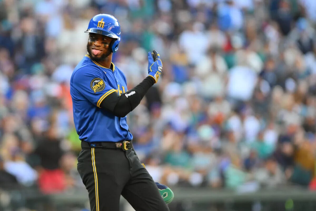 Mariners outfielder Victor Robles went on the injured list on Thursday with a pec strain.