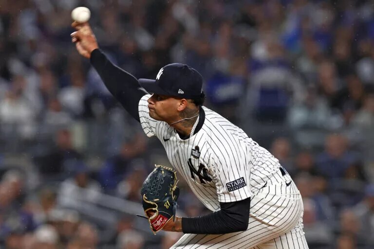 The Yankees will have to decide between Luis Gil (pictured) and Cam Schlittler as their third starting pitcher for the postseason.