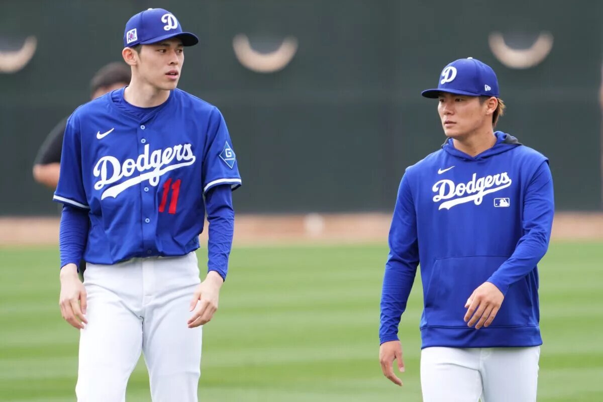 Dodgers manager Dave Roberts said he expects the team's two Japanese starters, Roki Sasaki (left) and Yoshinobu Yamamoto (right) to pitch in the team's opening series in Tokyo.