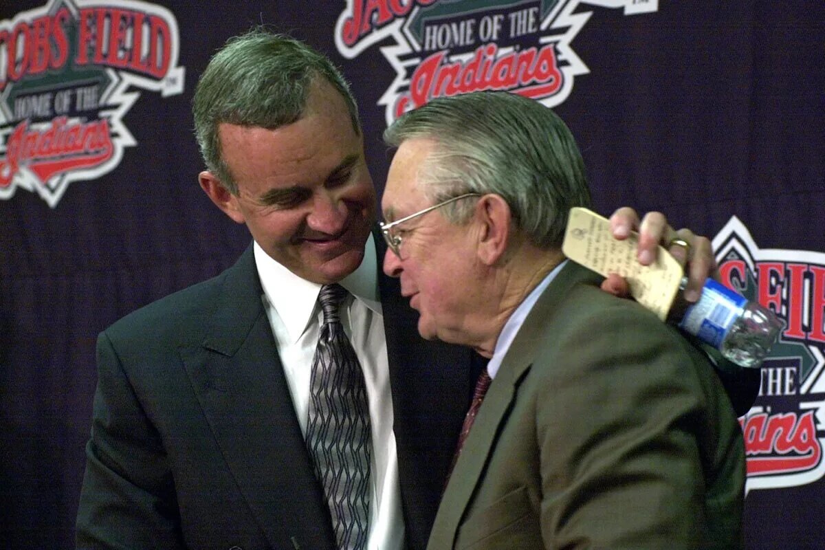 Longtime Cleveland Guardians owner Larry Dolan (right), pictured here with then-GM John Hart, passed away Sunday at age 94.
