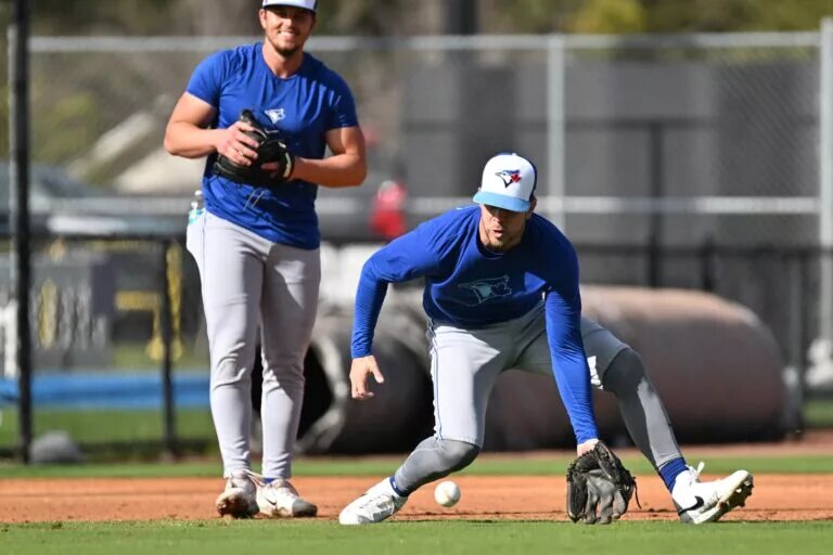Ernie Clement (right) is one of several contenders for the Blue Jays' third base job.