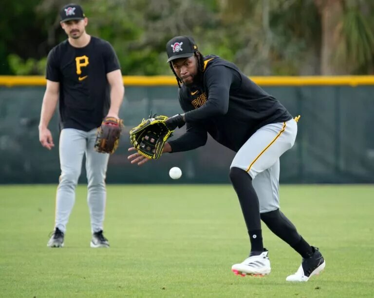 Oneil Cruz (right) is among several Pirates players now out of minor league options.