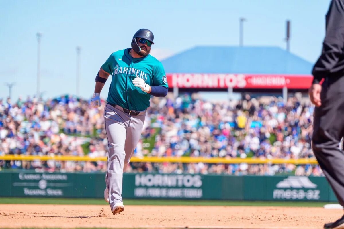Rowdy Tellez's strong spring for the Mariners raises questions about Mitch Haniger's future in Seattle.