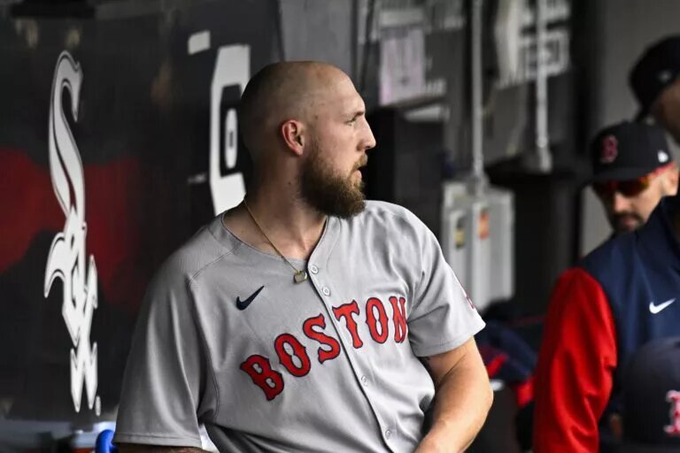 Red Sox pitcher Garrett Crochet (35) is seen in the dugout after Chicago White Sox third baseman Chase Meidroth (10) singles during the eighth inning at Guaranteed Rate Field in an April 2025 game.