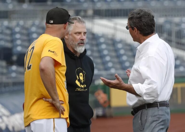The Pirates fired manager Derek Shelton (center) on Thursday, naming Don Kelly (left) as his replacement.