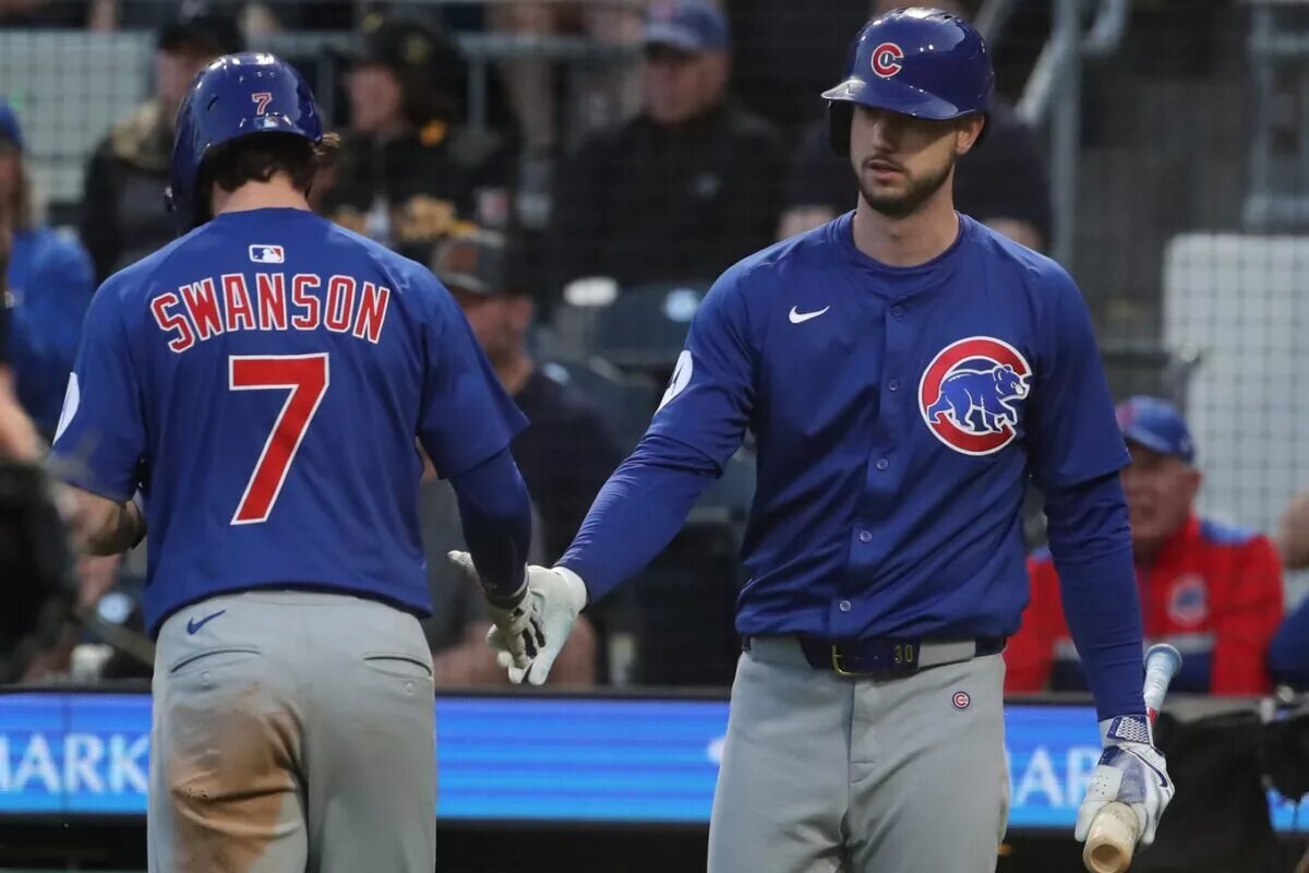 The Dodgers are reportedly interested in pursuing Cubs outfielder Kyle Tucker (right) when he becomes a free agent this offseason.