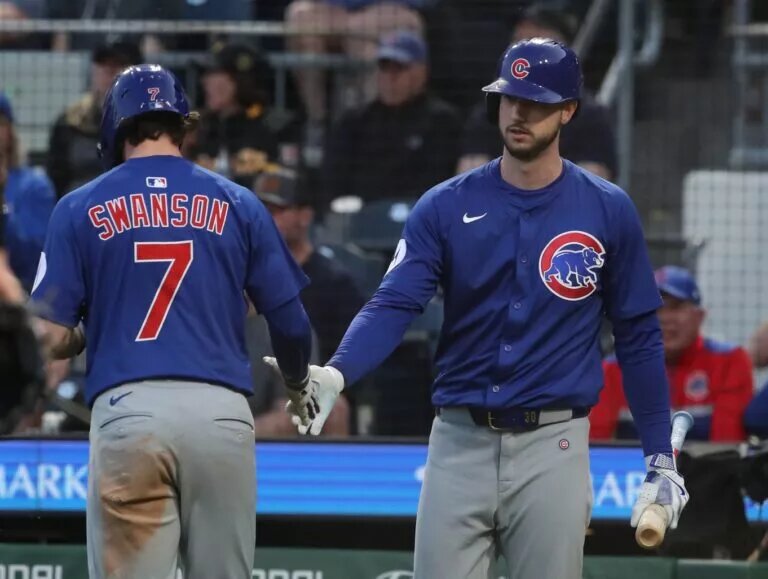 The Dodgers are reportedly interested in pursuing Cubs outfielder Kyle Tucker (right) when he becomes a free agent this offseason.
