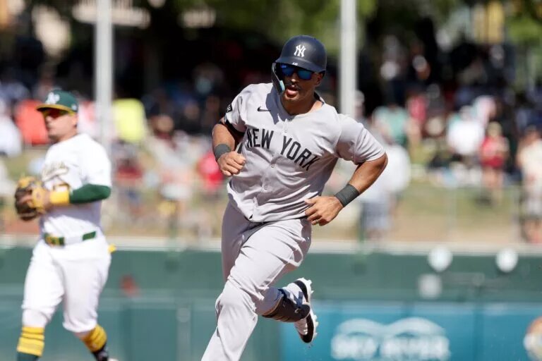 Trent Grisham accepted the qualifying offer to stay with the Yankees on Tuesday.