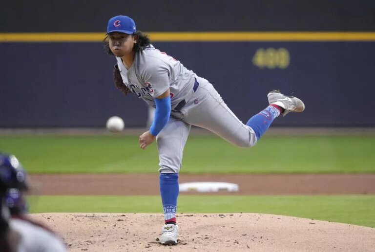 Cubs pitcher Shota Imanaga (18) delivers a pitch against the Milwaukee Brewers in the first inning at American Family Field in May 2025.