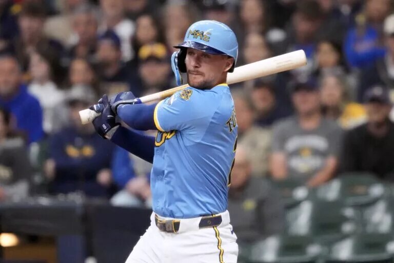 Milwaukee Brewers second baseman Brice Turang (2) hits an RBI single during the second inning against the St. Louis Cardinals at American Family Field in June 2025.