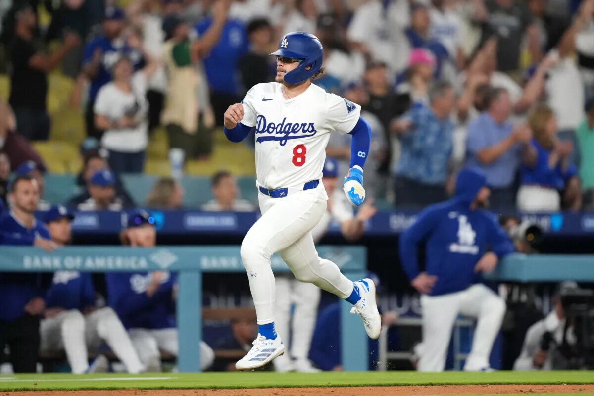Dodgers center fielder Kiké Hernandez (8) scores a run at Dodger Stadium.