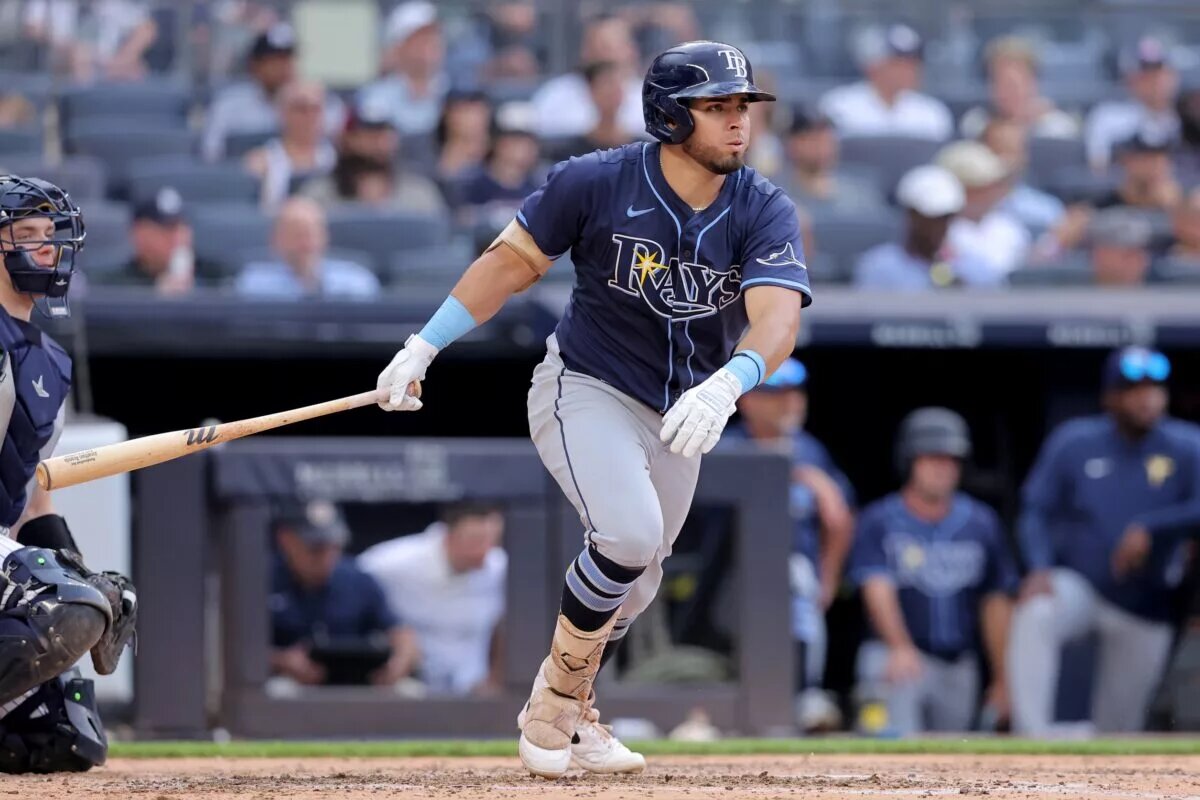 Jonathan Aranda of the Tampa Bay Rays runs to first after an RBI single against the New York Yankees at Yankee Stadium.
