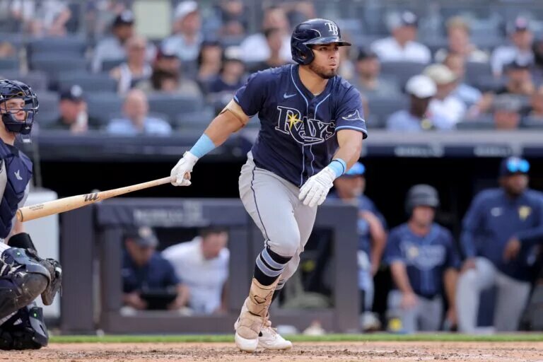 Jonathan Aranda of the Tampa Bay Rays runs to first after an RBI single against the New York Yankees at Yankee Stadium.