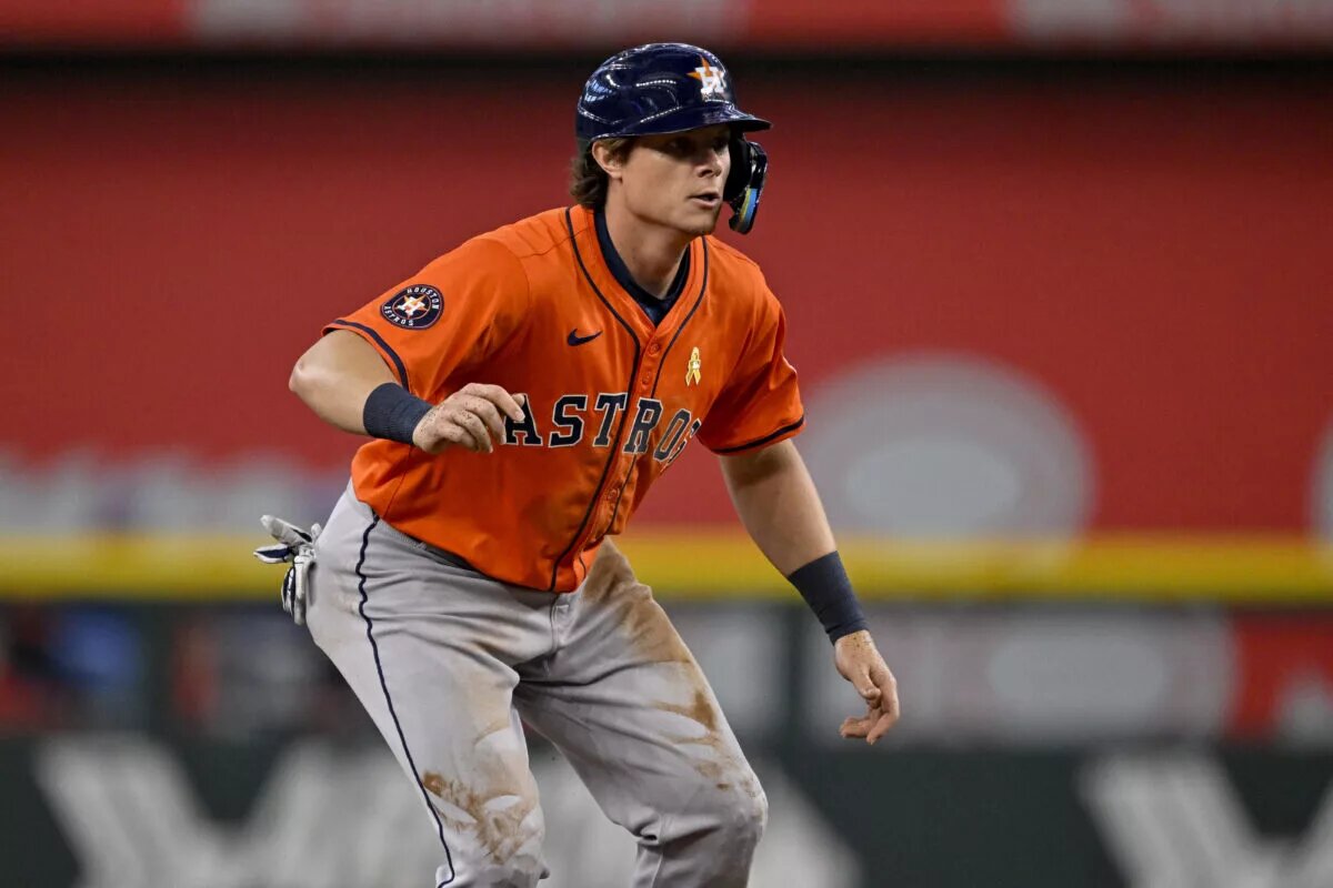 Astros center fielder Jake Meyers (6) looks on while running the bases.