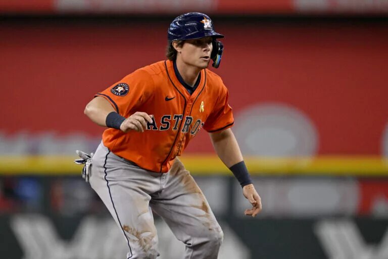 Astros center fielder Jake Meyers (6) looks on while running the bases.