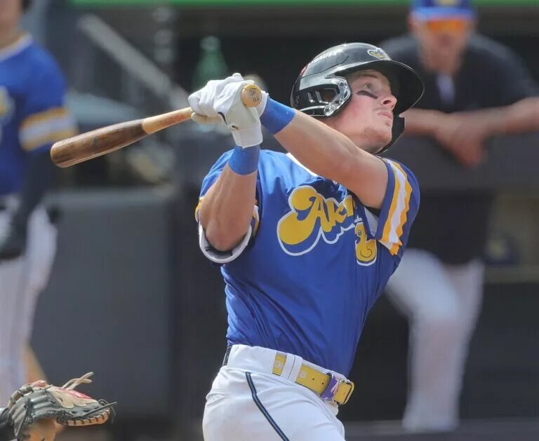 The Akron RubberDucks’ Travis Bazzana, a Cleveland Guardians prospect, follows a long fly ball at the wall in a game against the Altoona Curve on April 13, 2025, in Akron, Ohio, at Canal Park.