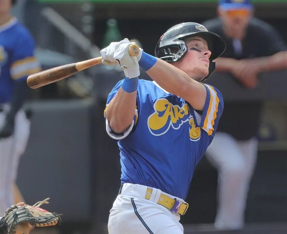 The Akron RubberDucks’ Travis Bazzana, a Cleveland Guardians prospect, follows a long fly ball at the wall in a game against the Altoona Curve on April 13, 2025, in Akron, Ohio, at Canal Park.