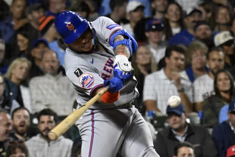 Mets catcher Francisco Alvarez hits a home run..