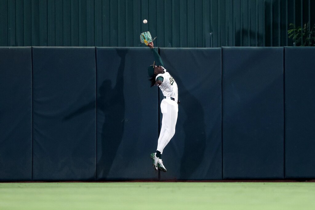 Athletics outfielder Lawrence Butler robs a home run against the Kansas City Royals at Sutter Health Park on September 27, 2025.