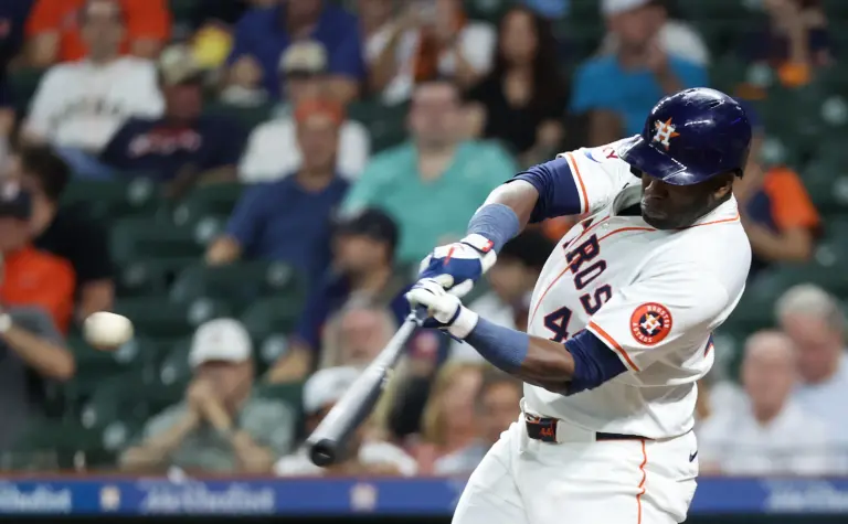 Houston Astros designated hitter Yordan Alverez (44) hits a single against the Kansas City Royals