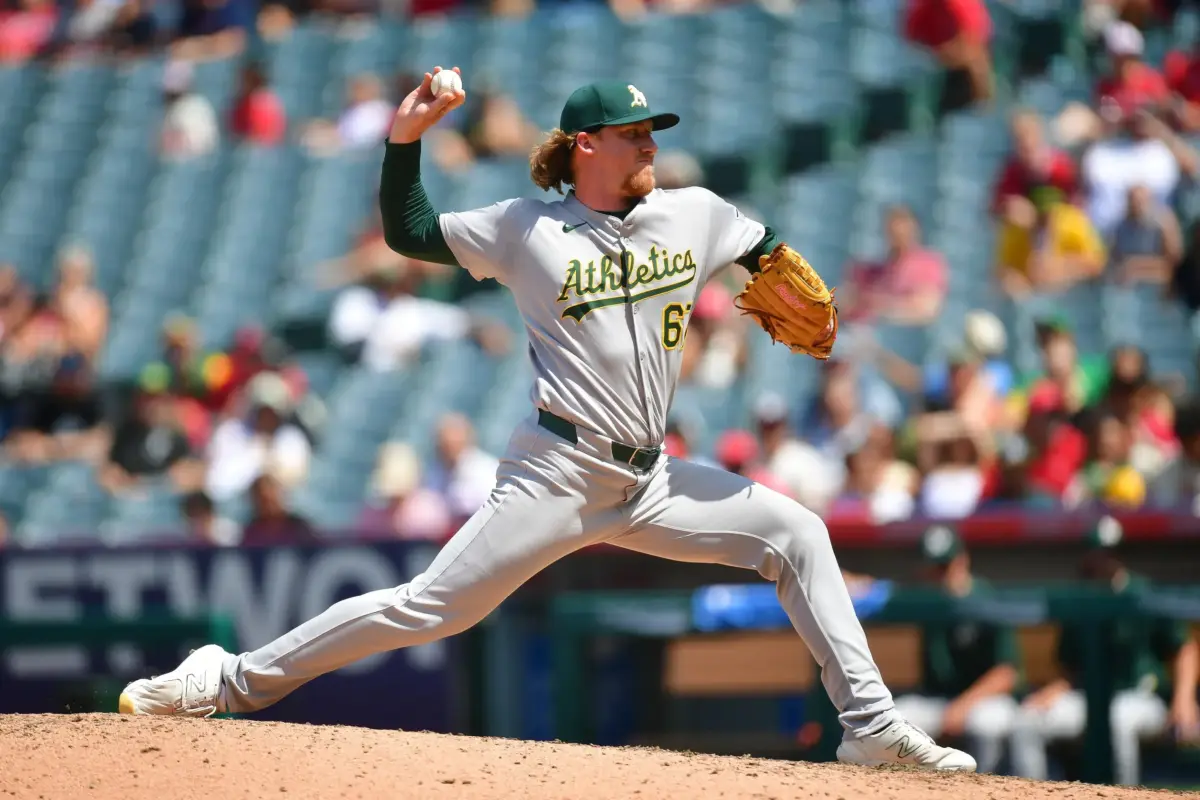 The Dodgers claimed reliever Grant Holman off waivers from the Diamondbacks on Wednesday.