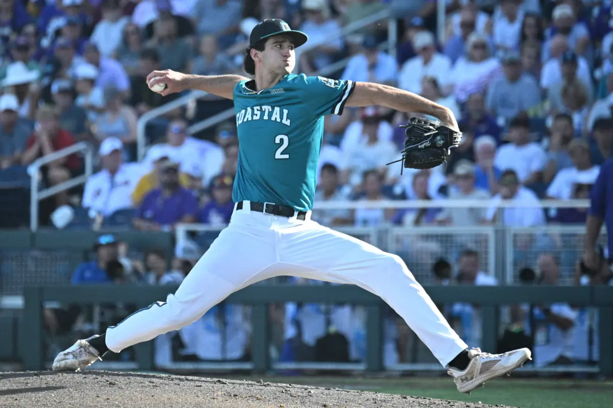 Coastal Carolina University starting pitcher Cameron Flukey pitching against the LSU Tigers during the first inning at Charles Schwab Field in Omaha, Nebraska on June 21, 2025.