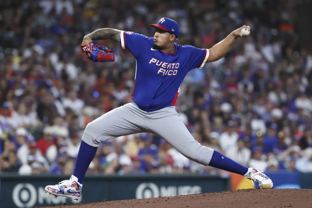 Puerto Rico pitcher Eduardo Rivera pitching against Team Italy during the quarterfinals of the WBC at Daikin Park in Houston, Texas on March 14, 2026.