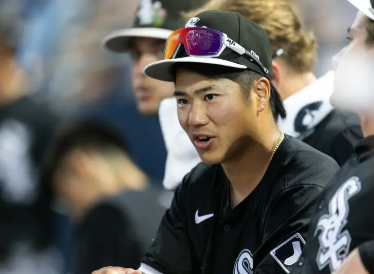 Chicago White Sox infielder Rikuu Nishida chatting with teammates on the bench during Spring Training on March 19, 2026 in Peoria, Arizona.