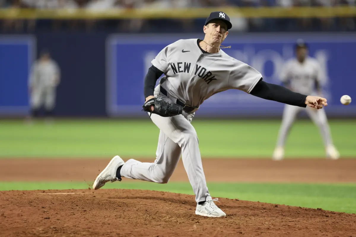 New York Yankees reliever Tim Hill throwing a pitch against the Tampa Bay Rays in the ninth inning at Tropicana Field in St. Petersburg, Florida on April 11, 2026.