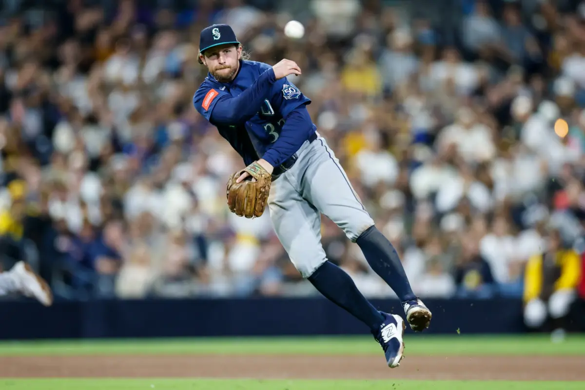 Seattle Mariners third baseman Brendan Donovan throwing to first after fielding a play at third in the seventh inning against the San Diego Padres at Petco Park on April 14th, 2026.