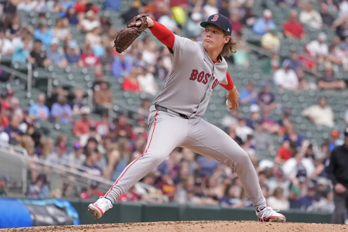 Red Sox starting pitcher Connelly Early gearing up to throw a pitch against the Minnesota Twins on April 15, 2026.