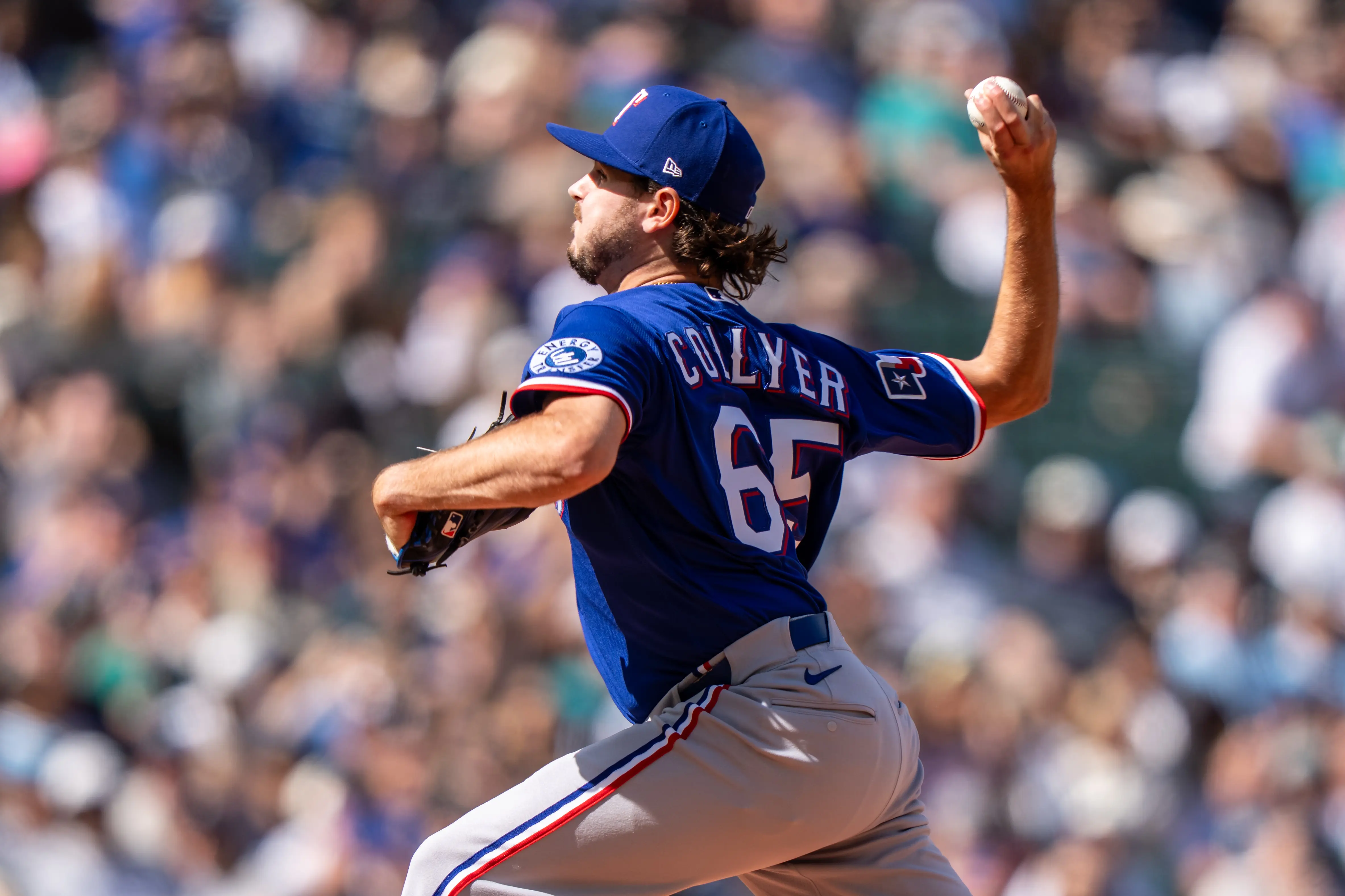 Texas Rangers reliever Gavin Collyer pitching against the Seattle Mariners in the seventh inning at T-Mobile Park on April 19, 2026 in Seattle, Washington.