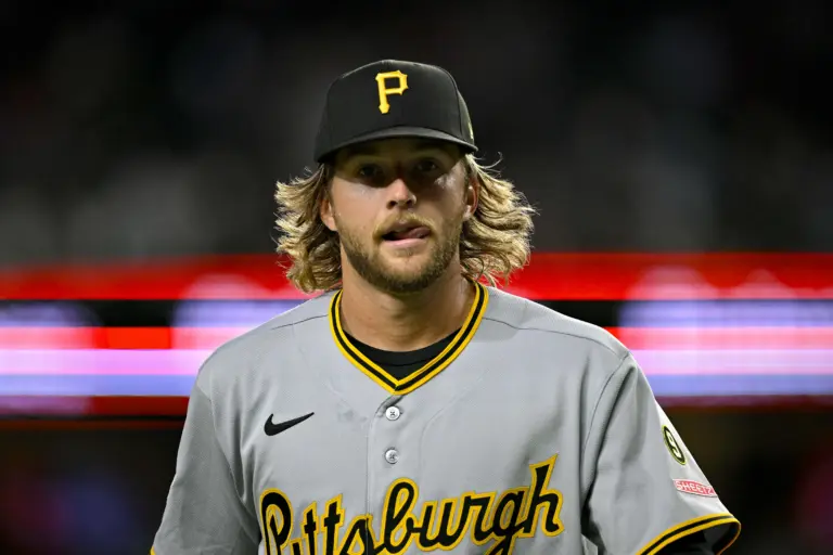 Pittsburgh Pirates starting pitcher Carmen Mlodzinski (50) comes off the field after he pitches against the Texas Rangers.