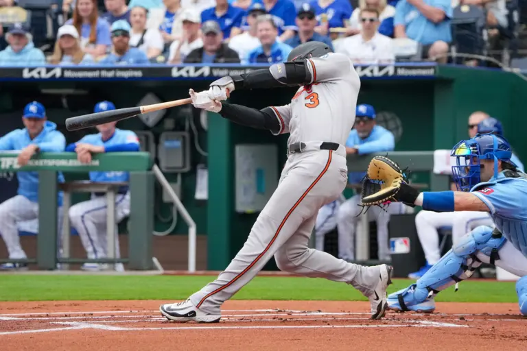 Baltimore Orioles Designated hitter Taylor Ward hitting a double in the first inning against the Kansas City Royals at Kauffman Stadium in Kansas City, Missouri on April 22, 2026.
