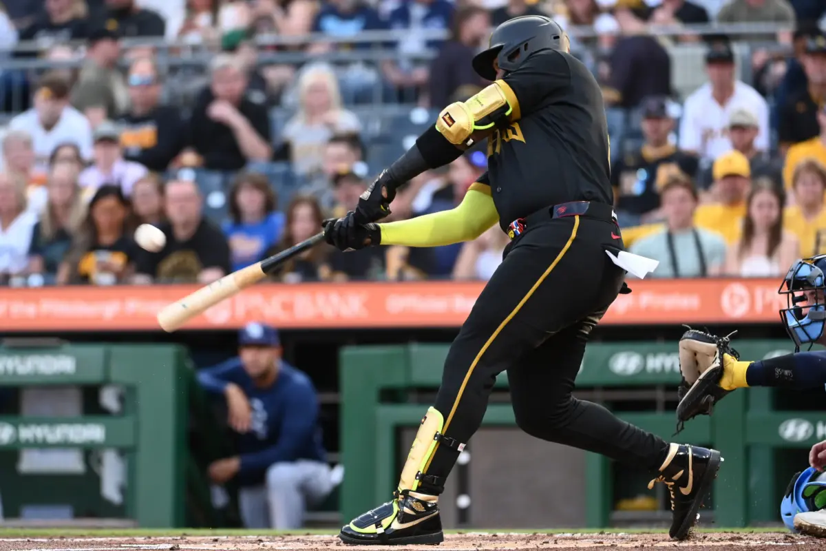 Pittsburgh Pirates designated hitter Marcell Ozuna hits a single in the second inning against the Tampa Bay Rays at PNC Park in Pittsburgh, Pennsylvania, on April 17, 2026.