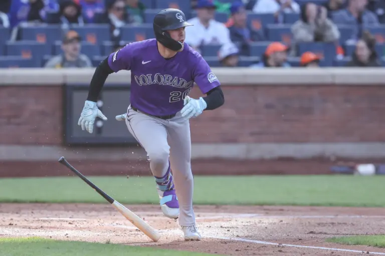 Colorado Rockies Designated Hitter Troy Johnston running to first base following a hit against the New York Mets on April 26, 2026 in Queens, New York.