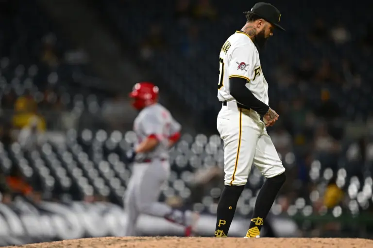Dennis Santana (60) waits for St. Louis Cardinals catcher Pedro Pages (43) to run the bases after hitting a solo home run during the ninth inning at PNC Park.