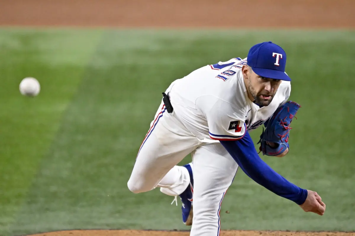 Texas Rangers starting pitcher Nathan Eovaldi delivering a pitch during the fourth inning against the New York Yankees at Globe Life Field in Arlington, Texas on April 29, 2026.