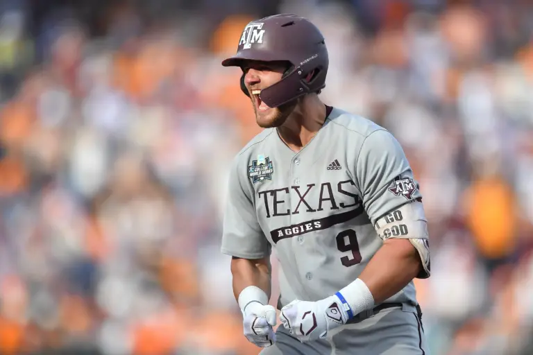 Texas A&M's Gavin Grahovac celebrating an RBI-single during game three of the College World Series Final against the Tennessee Volunteers at Charles Schwab Field in Omaha, Nebraska, on Monday June 24, 2024.