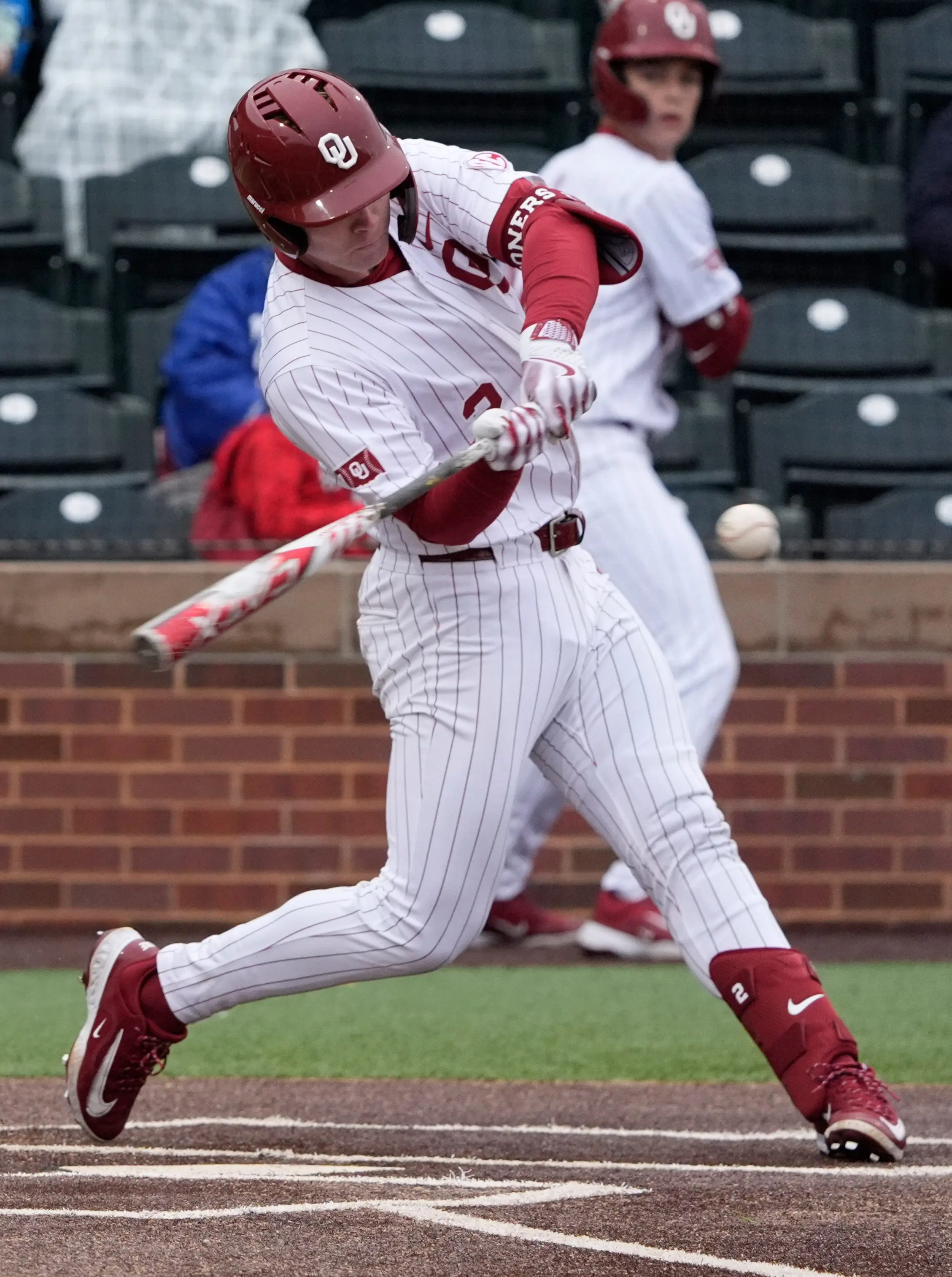 Oklahoma University's Easton Carmichael hitting against Lehigh University during a college baseball game at L. Dale Mitchell Park in Norman, Oklahoma on Friday, February 14, 2025.