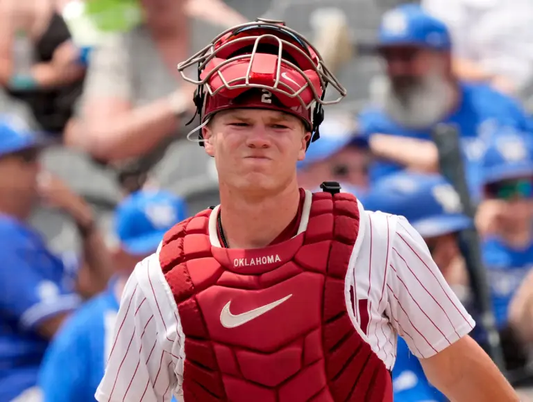 Oklahoma Sooners catcher Easton Carmichael grimacing after taking a foul ball off his ankle during Oklahoma's game against the Kentucky Wildcats in the first round of the SEC baseball tournament at the Hoover Met in Hoover, Alabama.