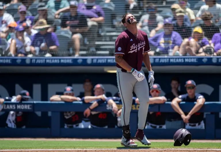 Texas A&M Aggies' Jace LaViolette (17) strains after getting hit in the hand by a pitch as Auburn Tigers take on Texas A&M Aggies during the SEC baseball tournament at Hoover Met in Birmingham, Ala., on Thursday, May 22, 2025.