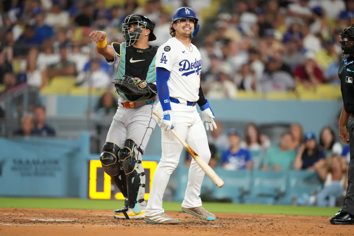 Los Angeles Dodgers third baseman Kike Hernandez reacts after striking out in the third inning vs the Arizona Diamondbacks at Dodgers Stadium in Los Angeles, California on August 29, 2025.