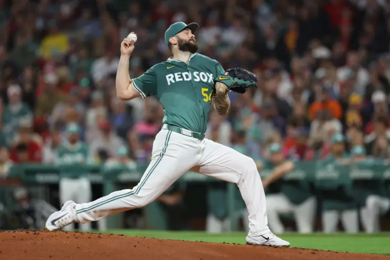 Starting pitcher Lucas Giolito (54) delivers a pitch during the second inning against the New York Yankees at Fenway Park.
