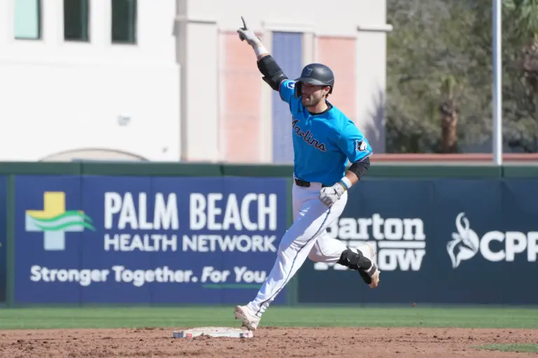 Miami Marlins catcher Joe Mack celebrates rounding second after hitting a grand slam in the fifth inning against the Philadelphia Phillies at Roger Dean Chevrolet Stadium in Jupiter, Florida on February 24, 2026.