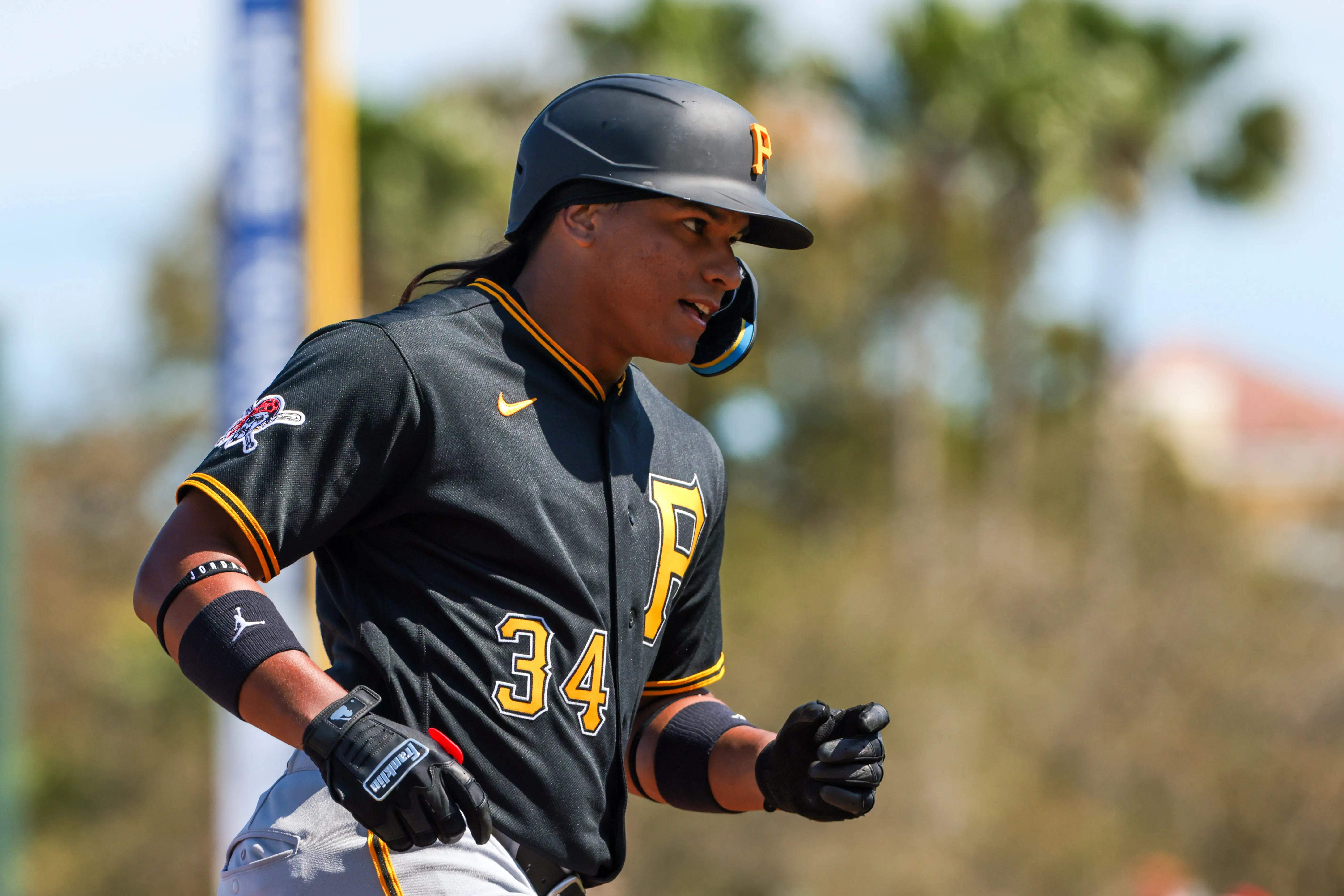Pittsburgh Pirates left fielder Jhostynxon Garcia (34) rounds the bases after hitting a home run against the St. Louis Cardinals during the fourth inning at Roger Dean Chevrolet Stadium.