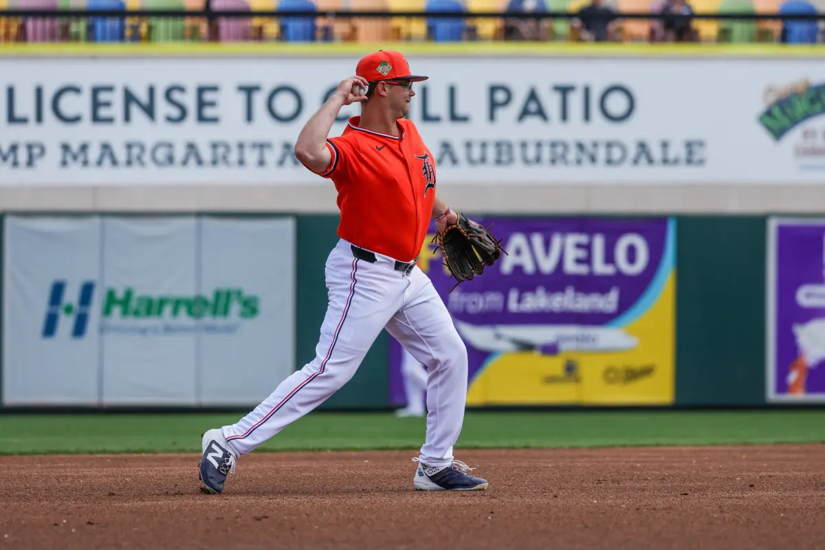 Detroit Tigers second baseman Max Anderson (82) throws to first during the first inning against the Boston Red Sox at Publix Field at Joker Marchant Stadium