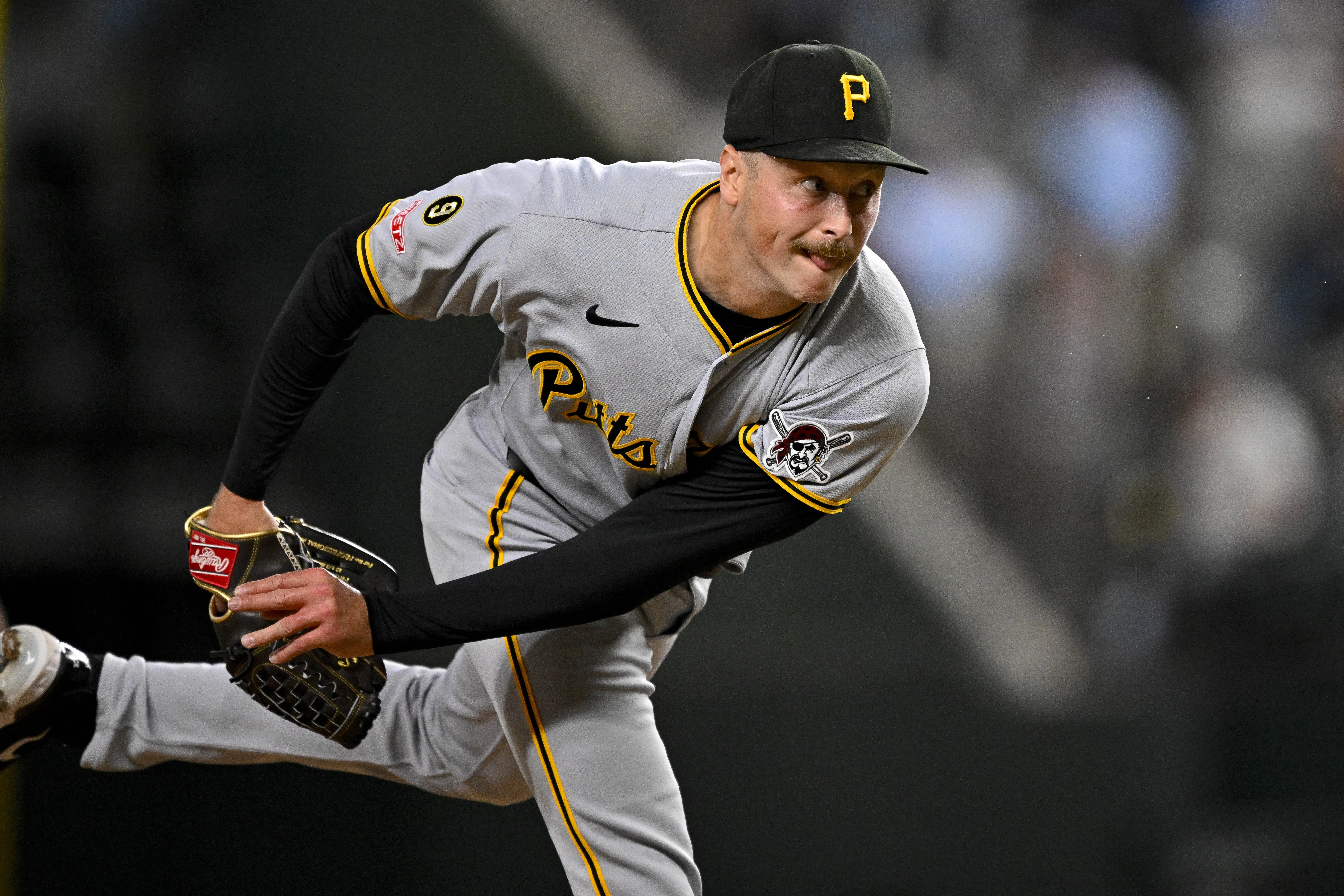Pittsburgh Pirates reliever Evan Sisk pitching against the Texas Rangers during the eighth inning at Globe Life Field in Arlington, Texas on April 21, 2026.